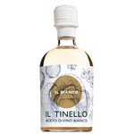 Eine 250-ml-Flasche Weißweinessig Il Tinello Aceto Di Vino Bianco von Il Borgo del Balsamico mit einem illustrierten Etikett, auf dem ein Mädchen bei der Weinlese zu sehen ist.