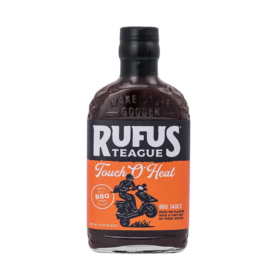 Abgebildet ist eine 432-g-Flasche Rufus Teague Touch O Heat Sauce mit einem schwarz-orangenen Etikett auf weißem Hintergrund.